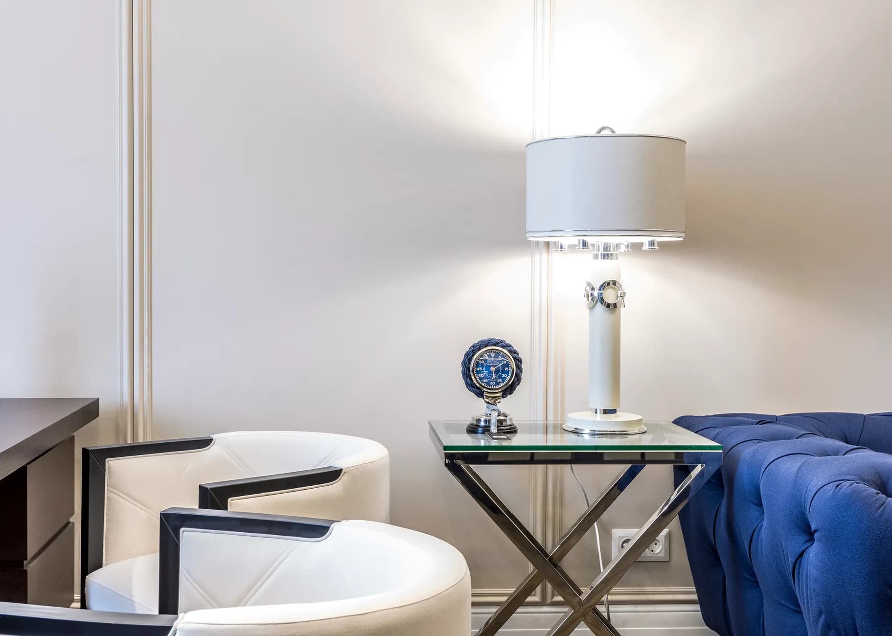 Warm contemporary living room with a table lamp