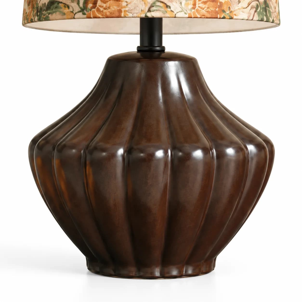 Wood-finish table lamp styled in a warm contemporary space